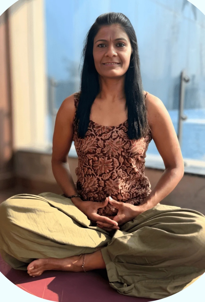 Divya teaching yoga